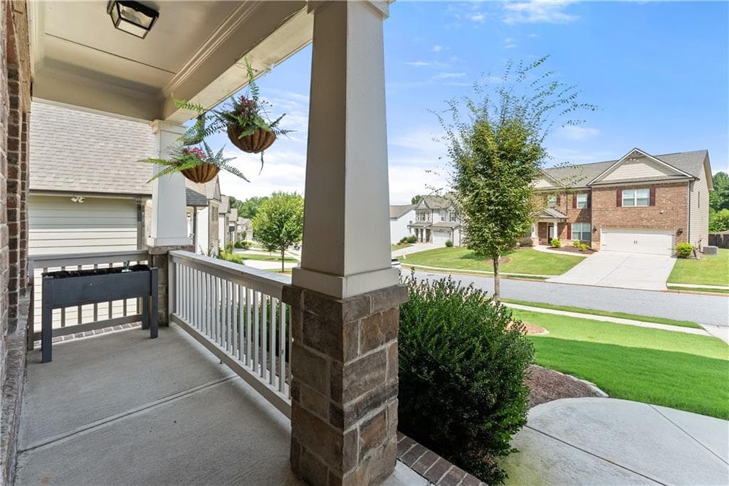 5 bedroom, 4 bathroom, 3,013 sq ft single family residence for sale at 7129 Birch View Court, Flowery Branch, GA 30542 — photo 4