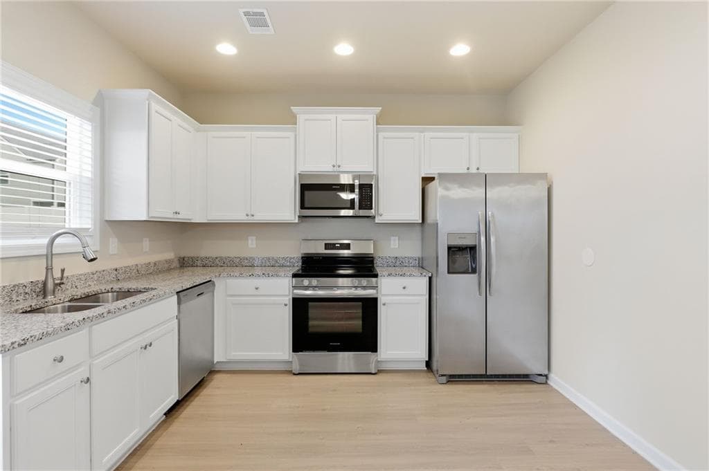 4 bedroom, 2 bathroom, 1,726 sq ft single family residence for sale at 146 Culver Street, Jackson, GA 30233 — photo 5