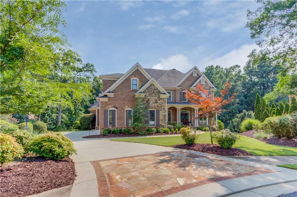 6 bedroom, 7 bathroom, 7,123 sq ft single family residence for sale at 5318 Binghurst Court, Suwanee, GA 30024 — photo 1 of 109