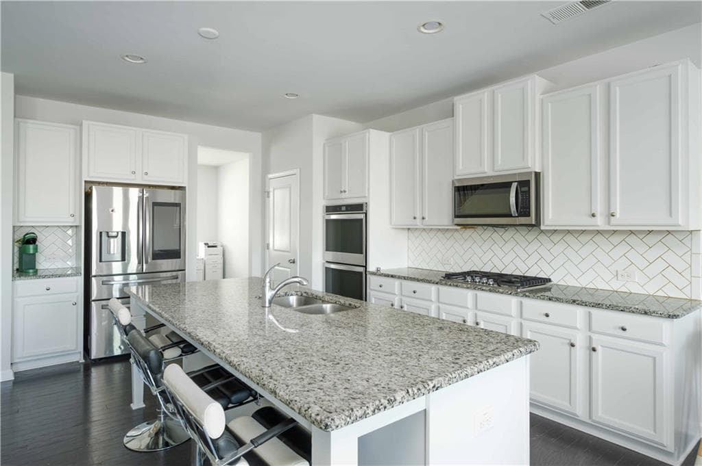 4 bedroom, 4 bathroom, 3,000 sq ft single family residence for sale at 2649 Ogden Trail, Buford, GA 30519 — photo 4