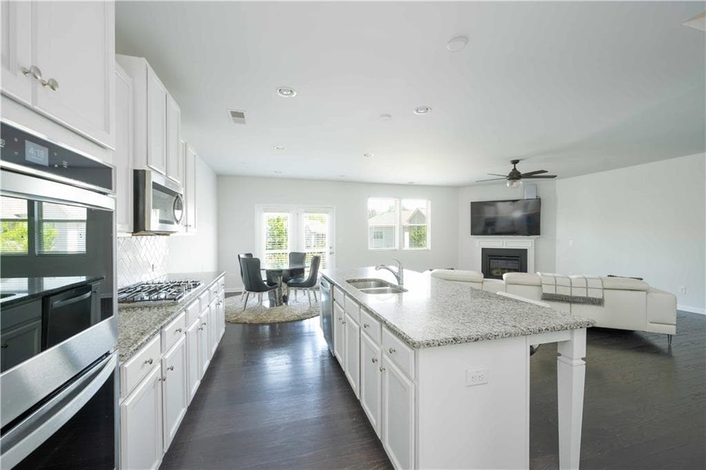 4 bedroom, 4 bathroom, 3,000 sq ft single family residence for sale at 2649 Ogden Trail, Buford, GA 30519 — photo 5