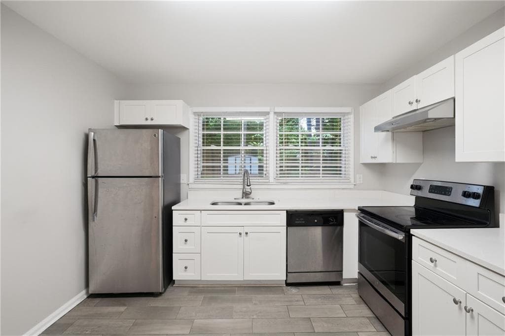 4 bedroom, 3 bathroom, 1,975 sq ft single family residence for sale at 1604 Drayton Woods Drive, Tucker, GA 30084 — photo 8