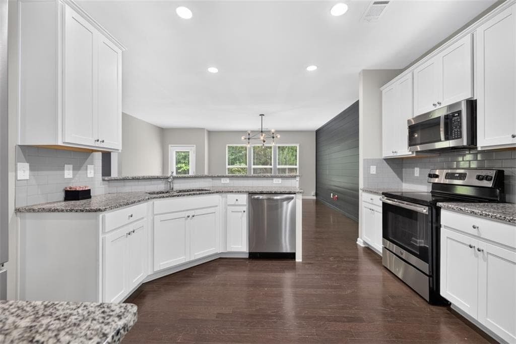 4 bedroom, 3 bathroom, 2,345 sq ft single family residence for sale at 1729 Charcoal Ives Road, Lawrenceville, GA 30045 — photo 4