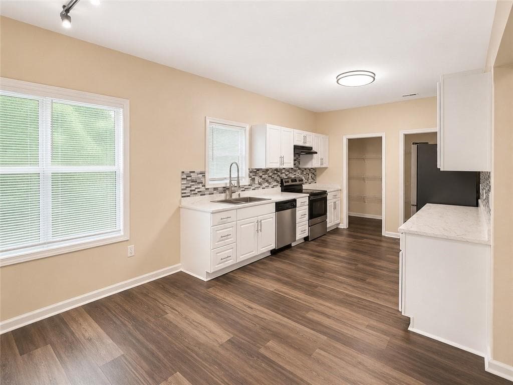 5 bedroom, 3 bathroom, 2,384 sq ft single family residence for sale at 2315 Lake Royale Drive, Riverdale, GA 30296 — photo 5