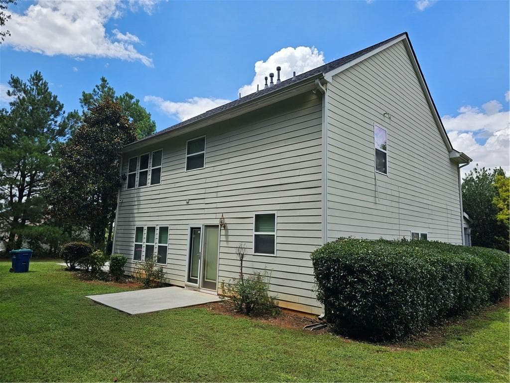 4 bedroom, 3 bathroom, 2,618 sq ft single family residence for sale at 5408 Bighorn Pass, Atlanta, GA 30349 — photo 3
