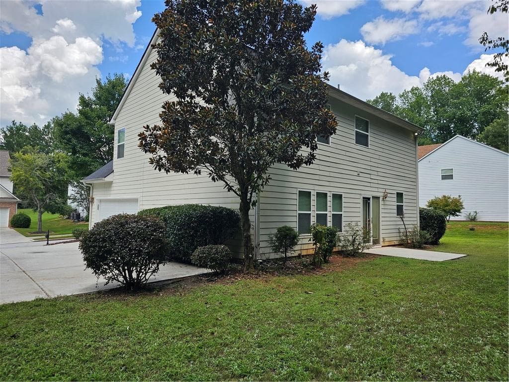 4 bedroom, 3 bathroom, 2,618 sq ft single family residence for sale at 5408 Bighorn Pass, Atlanta, GA 30349 — photo 4