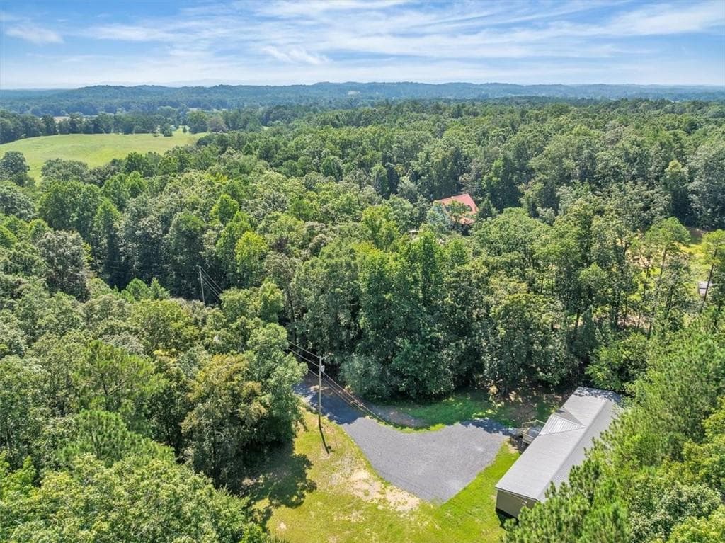 4 bedroom, 2 bathroom, 2,128 sq ft single family residence for sale at 827 Brackett Ridge Road, Chatsworth, GA 30705 — photo 2