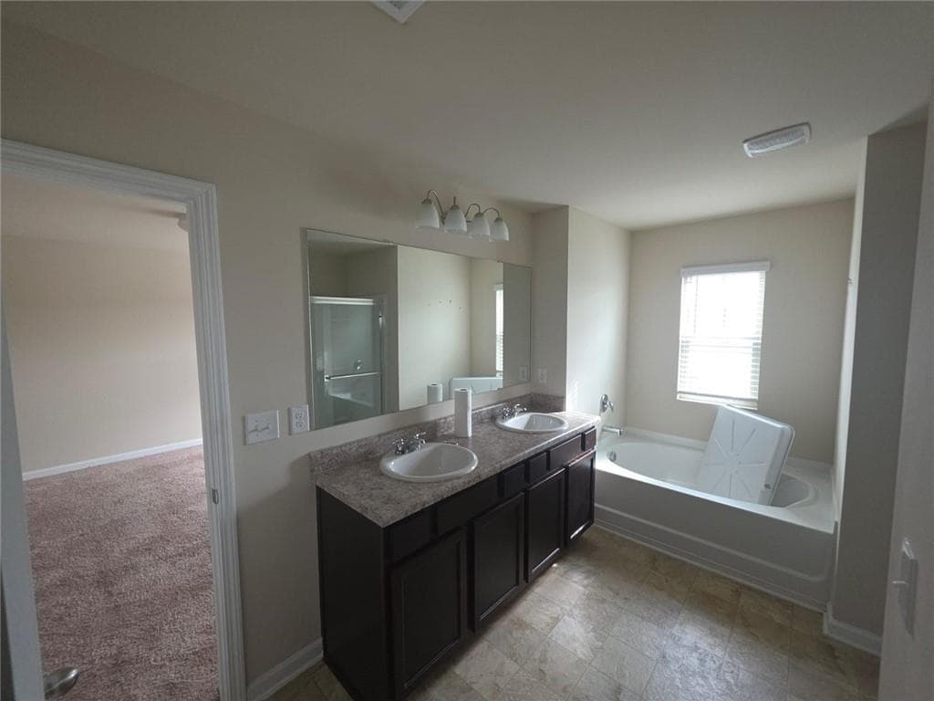 5 bedroom, 3 bathroom, 2,556 sq ft single family residence for rent at 3877 Makeover Court, South Fulton, GA 30349 for $2,800 a month — photo 8