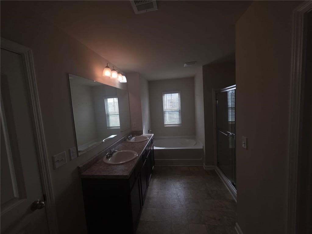 5 bedroom, 3 bathroom, 2,556 sq ft single family residence for rent at 3877 Makeover Court, South Fulton, GA 30349 for $2,800 a month — photo 10