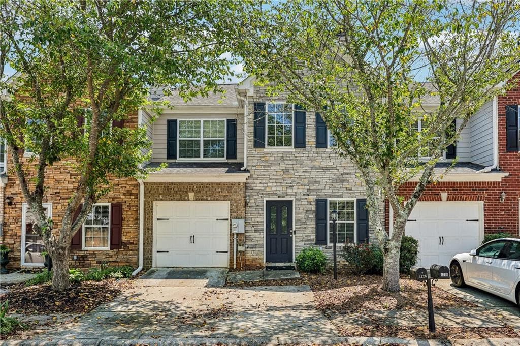 3 bedroom, 3 bathroom, 1,956 sq ft townhouse for sale at 4228 Chatham Ridge Drive, Buford, GA 30518 — photo 1 of 42