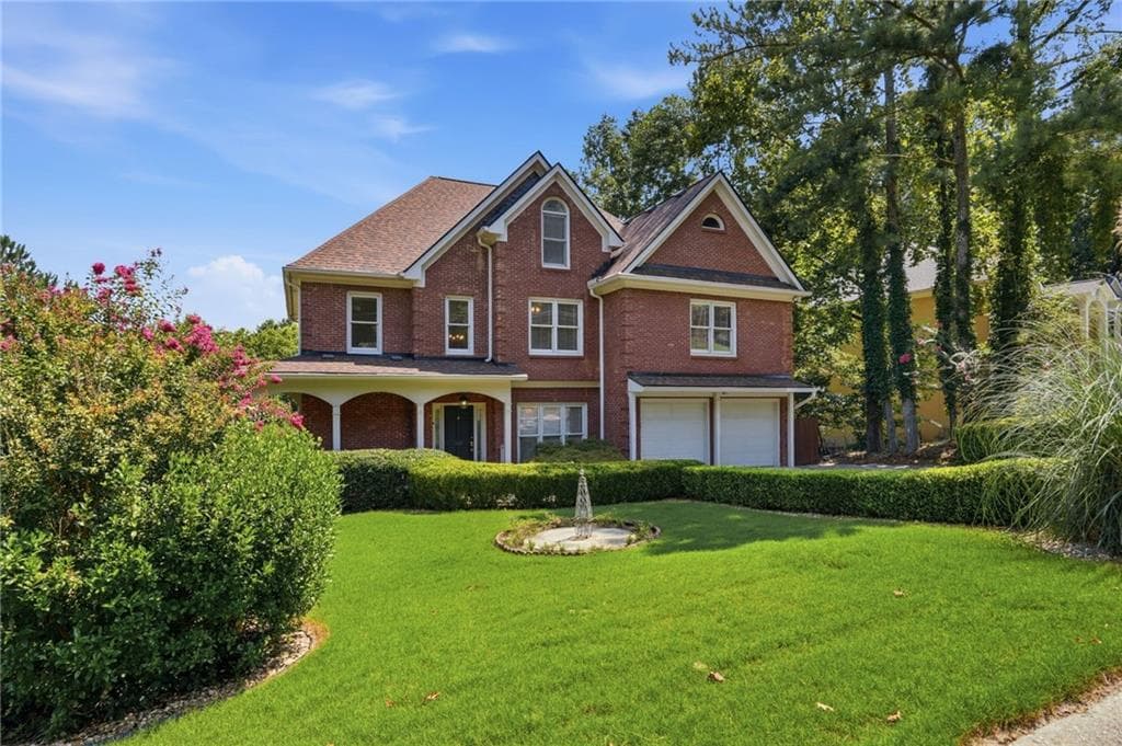 7 bedroom, 5 bathroom, 5,388 sq ft single family residence for sale at 1340 Eryn Circle, Suwanee, GA 30024 — photo 7