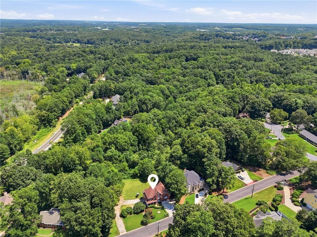 7 bedroom, 5 bathroom, 5,388 sq ft single family residence for sale at 1340 Eryn Circle, Suwanee, GA 30024 — photo 9