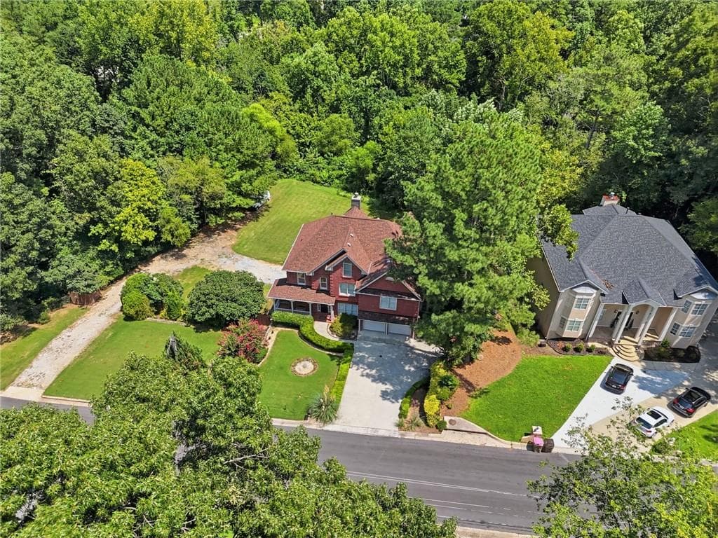 7 bedroom, 5 bathroom, 5,388 sq ft single family residence for sale at 1340 Eryn Circle, Suwanee, GA 30024 — photo 10