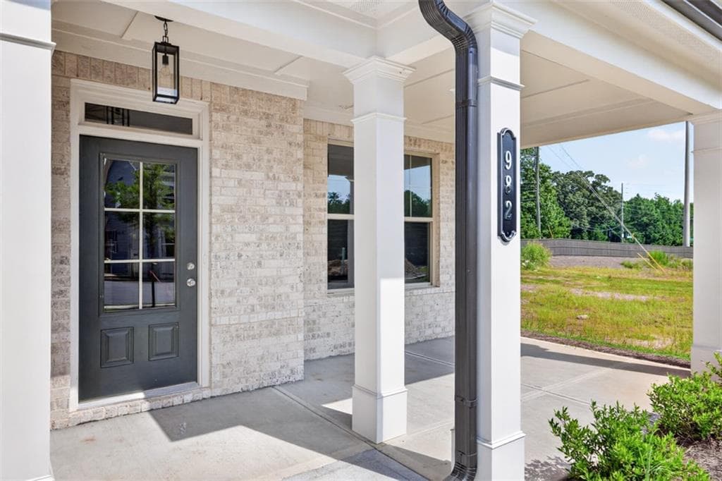 4 bedroom, 4 bathroom, 2,614 sq ft single family residence for sale at 982 Homepark Circle, Buford, GA 30518 — photo 3