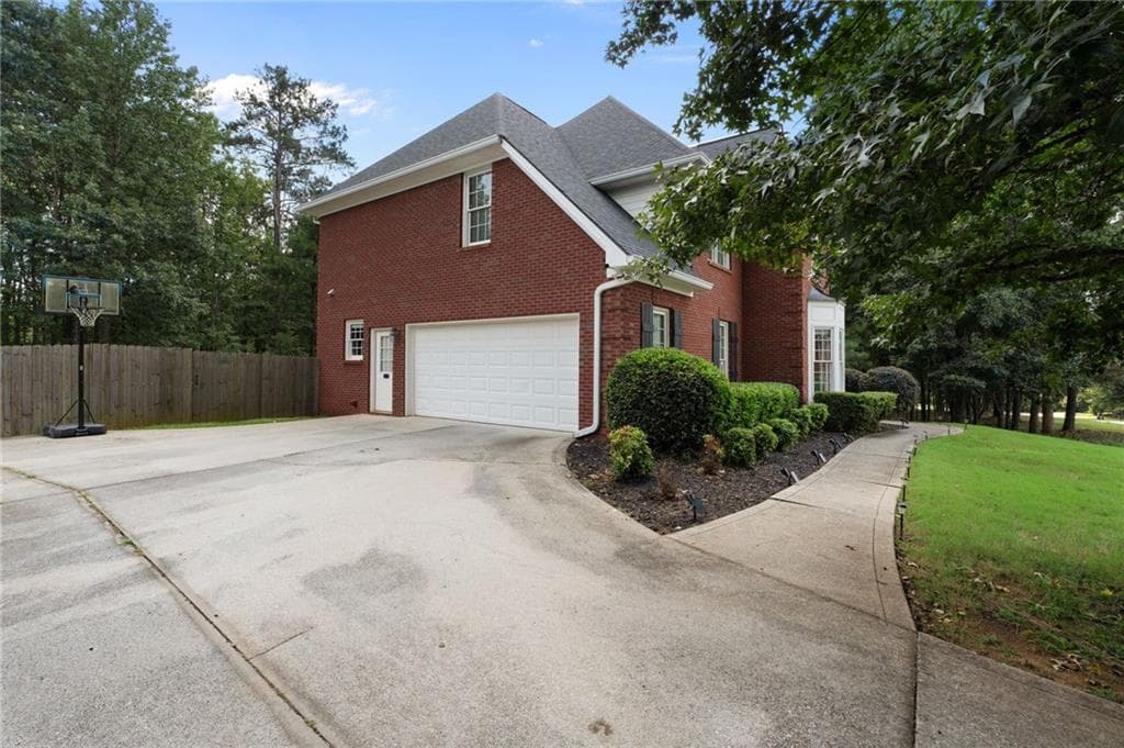 5 bedroom, 4 bathroom, 4,185 sq ft single family residence for sale at 40 Rose Creek Drive, Covington, GA 30014 — photo 5