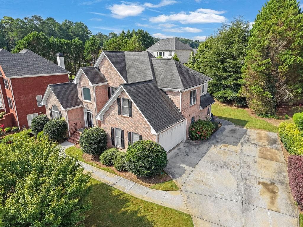 6 bedroom, 5 bathroom, 5,835 sq ft single family residence for sale at 2977 Cadbury Court, Snellville, GA 30039 — photo 8