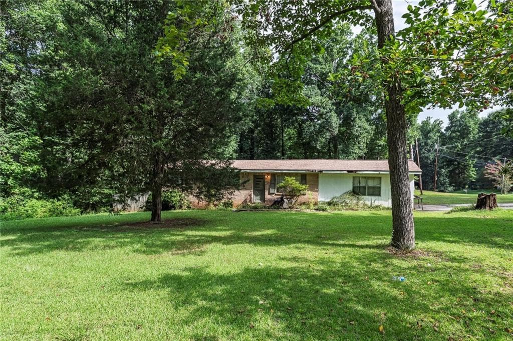 3 bedroom, 2 bathroom, 1,125 sq ft single family residence for sale at 5000 Paris Avenue, Powder Springs, GA 30127 — photo 2