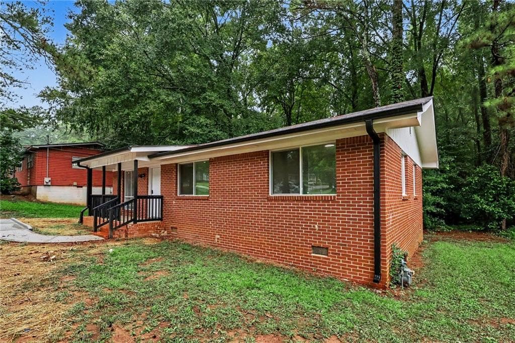 3 bedroom, 1 bathroom, 1,080 sq ft single family residence for sale at 6186 Green Acres Drive, Covington, GA 30014 — photo 2