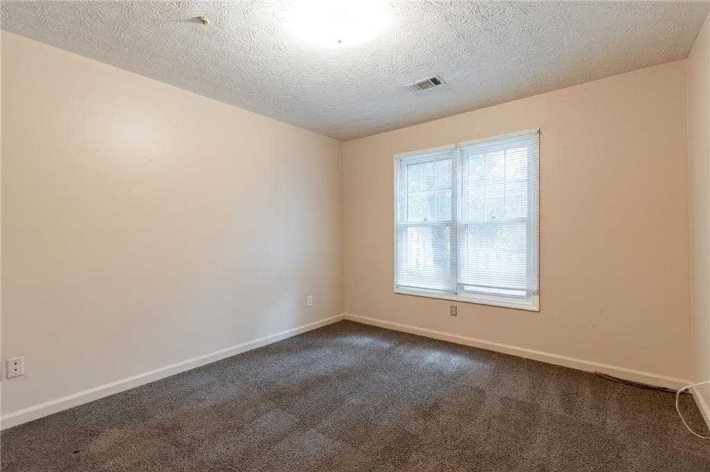 2 bedroom, 2 bathroom, 1,323 sq ft townhouse for sale at 2250 Wellington Circle, Lithonia, GA 30058 — photo 10