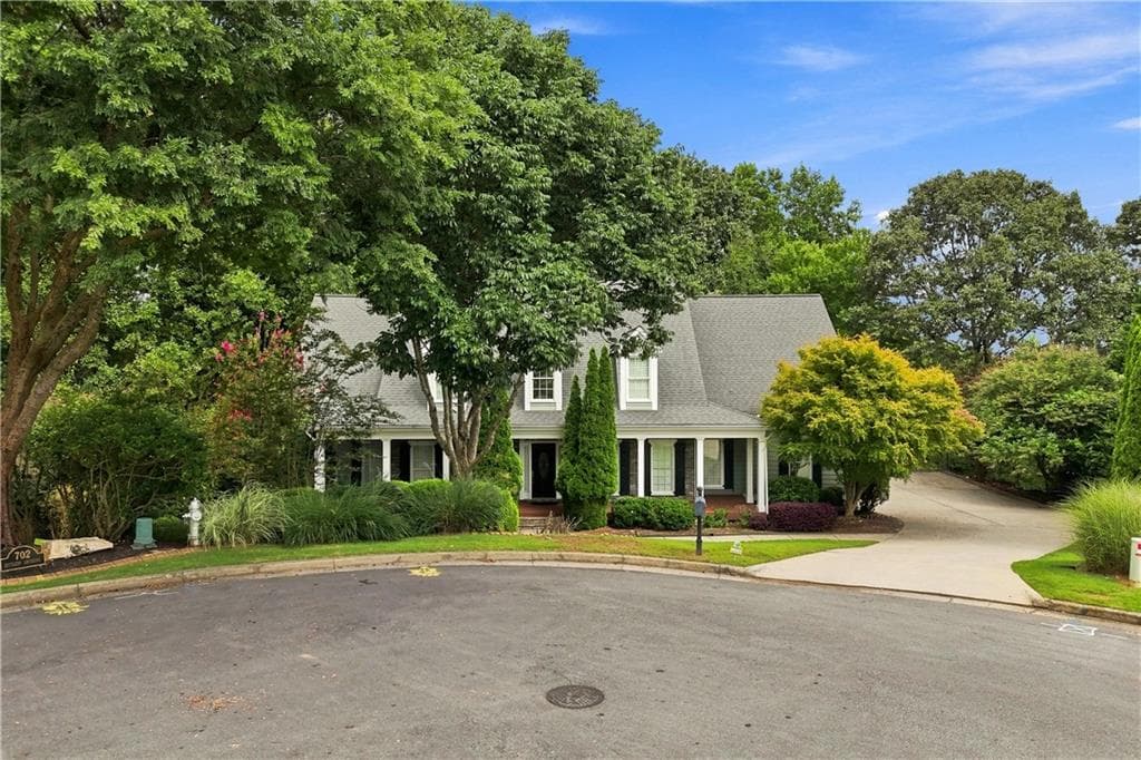 6 bedroom, 5 bathroom, 5,751 sq ft single family residence for sale at 700 Settlers Crossing, Canton, GA 30114 — photo 2