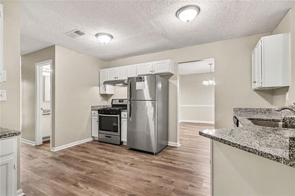 4 bedroom, 3 bathroom, 2,254 sq ft single family residence for sale at 1298 Berryhill Drive, Lithonia, GA 30058 — photo 9