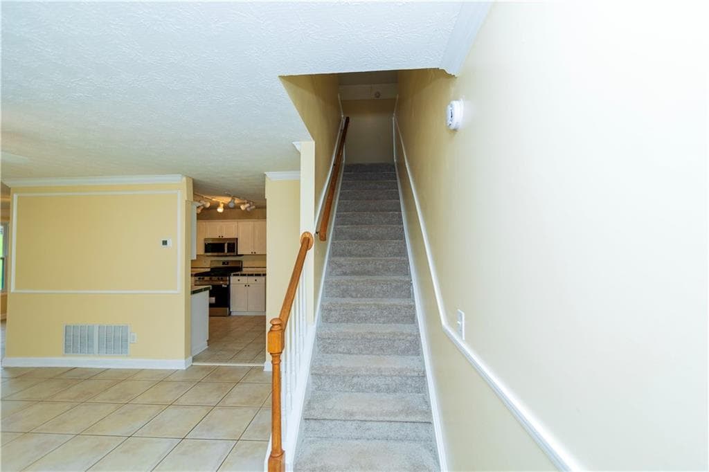 3 bedroom, 3 bathroom, 1,515 sq ft single family residence for sale at 3740 Maple Valley Drive, Cumming, GA 30040 — photo 3