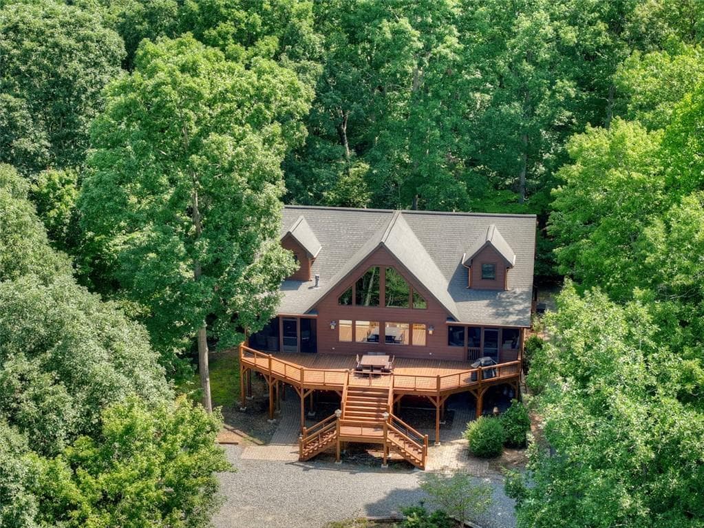 5 bedroom, 4 bathroom, 3,937 sq ft single family residence for sale at 85 Squirrel Chase, Morganton, GA 30560 — photo 2