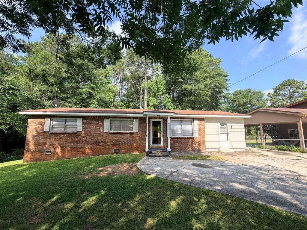 3 bedroom, 1 bathroom, 1,344 sq ft single family residence for sale at 7132 Green Acres Court, Covington, GA 30014 — photo 2