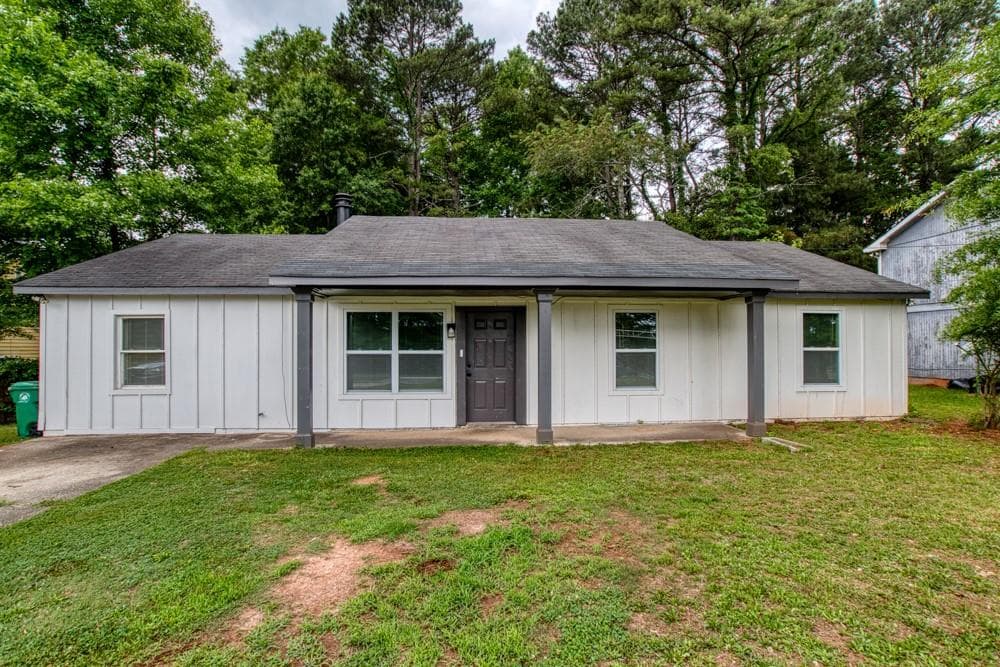 4 bedroom, 2 bathroom, 1,566 sq ft single family residence for sale at 1107 Panola Road, Stone Mountain, GA 30088 — photo 2