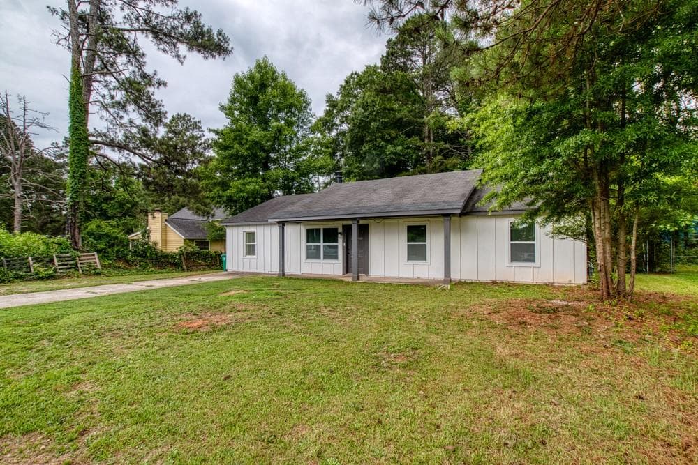 4 bedroom, 2 bathroom, 1,566 sq ft single family residence for sale at 1107 Panola Road, Stone Mountain, GA 30088 — photo 3