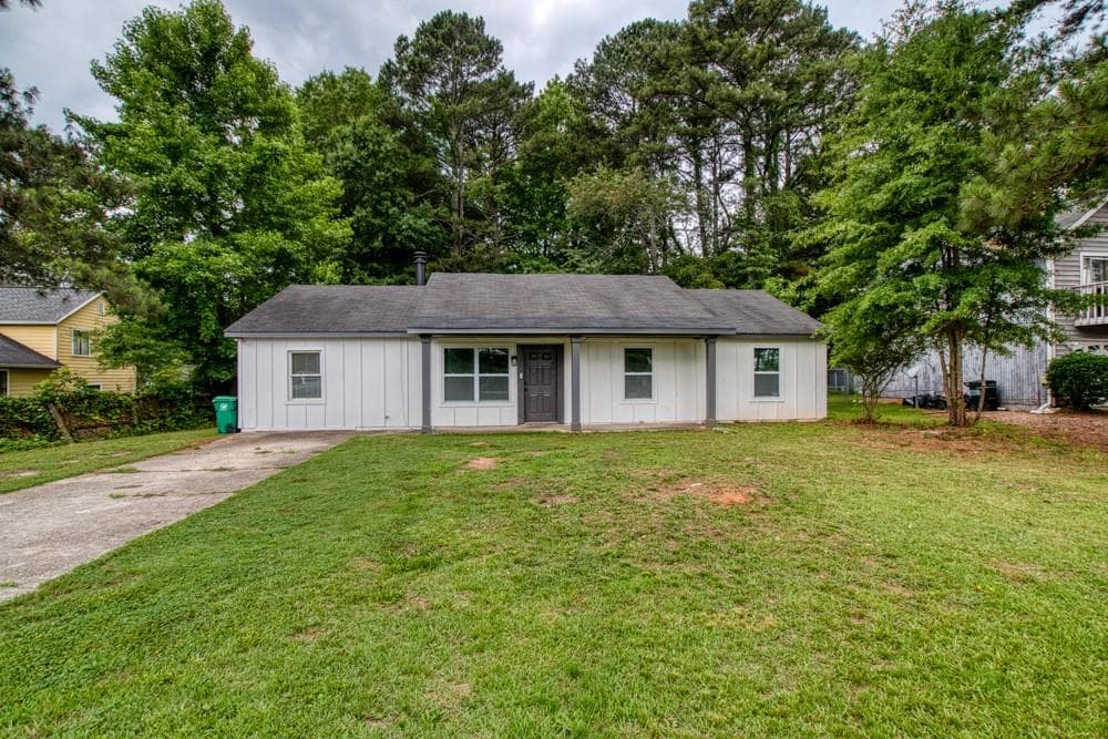 4 bedroom, 2 bathroom, 1,566 sq ft single family residence for sale at 1107 Panola Road, Stone Mountain, GA 30088 — photo 4
