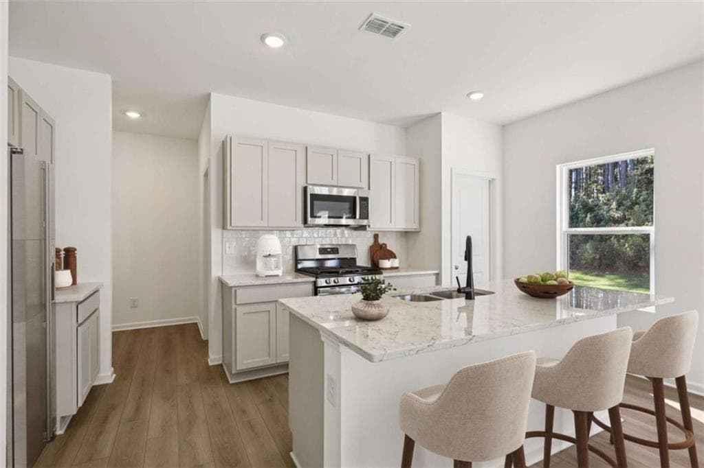 4 bedroom, 3 bathroom, 2,091 sq ft single family residence for sale at 5348 Heron Bay Boulevard, Locust Grove, GA 30248 — photo 8