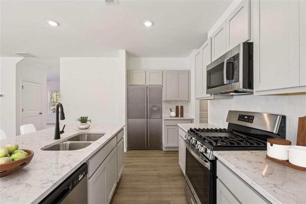 4 bedroom, 3 bathroom, 2,091 sq ft single family residence for sale at 5348 Heron Bay Boulevard, Locust Grove, GA 30248 — photo 9