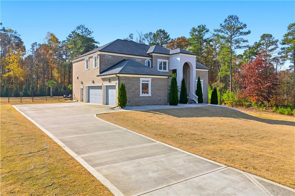 6 bedroom, 6 bathroom, 7,624 sq ft single family residence for sale at 1616 Palmilla Way, Stockbridge, GA 30281 — photo 2