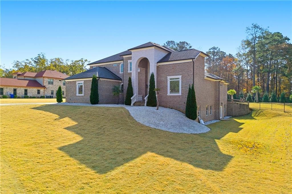 6 bedroom, 6 bathroom, 7,624 sq ft single family residence for sale at 1616 Palmilla Way, Stockbridge, GA 30281 — photo 3