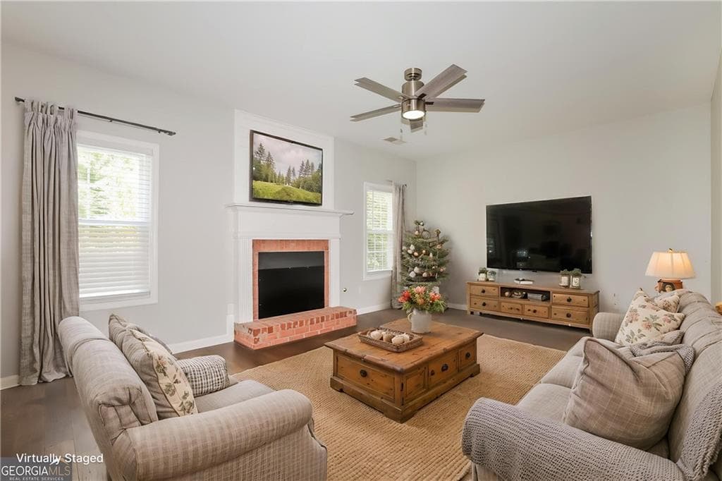 4 bedroom, 3 bathroom, 2,636 sq ft single family residence for sale at 7340 Lanier Cove Court, Cumming, GA 30041 — photo 4