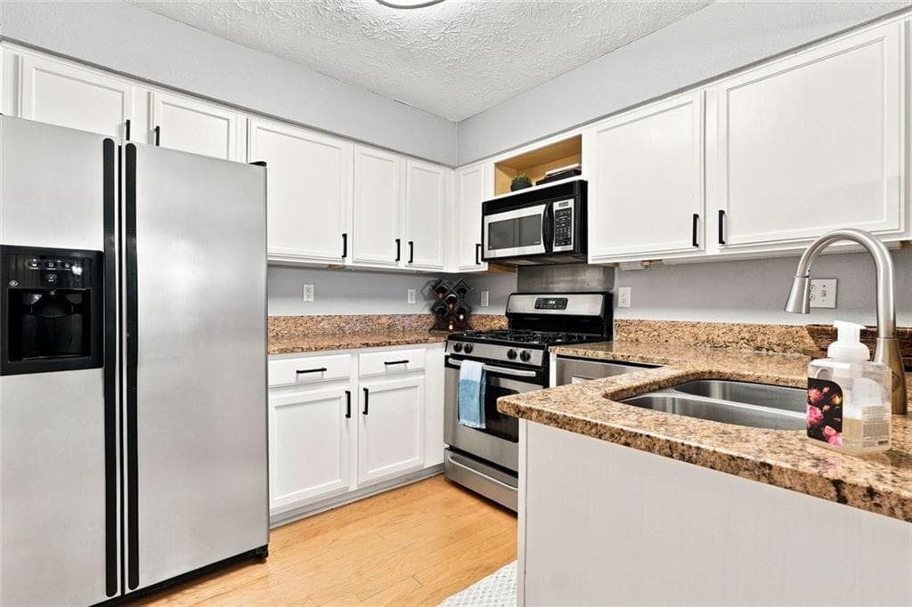 1 bedroom, 1 bathroom, 1,214 sq ft condominium for sale at 3940 Riverlook Parkway 103, Marietta, GA 30067 — photo 9