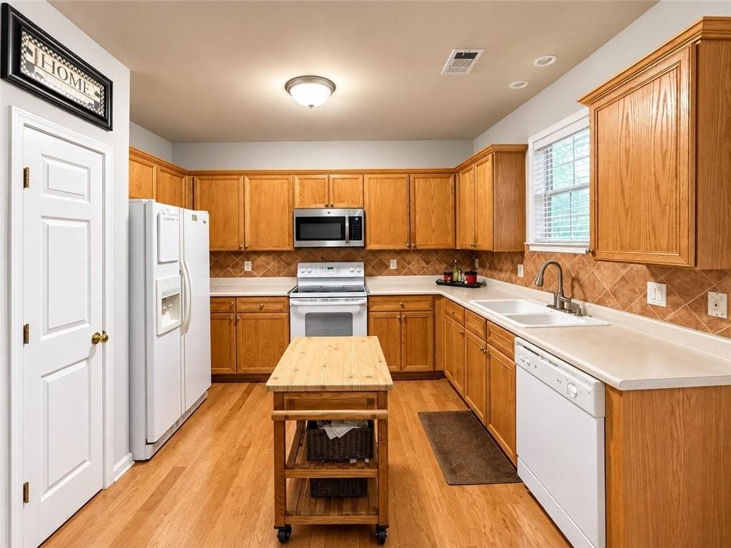 4 bedroom, 3 bathroom, 2,482 sq ft single family residence for sale at 1423 Lady Slipper Court, Kennesaw, GA 30152 — photo 9