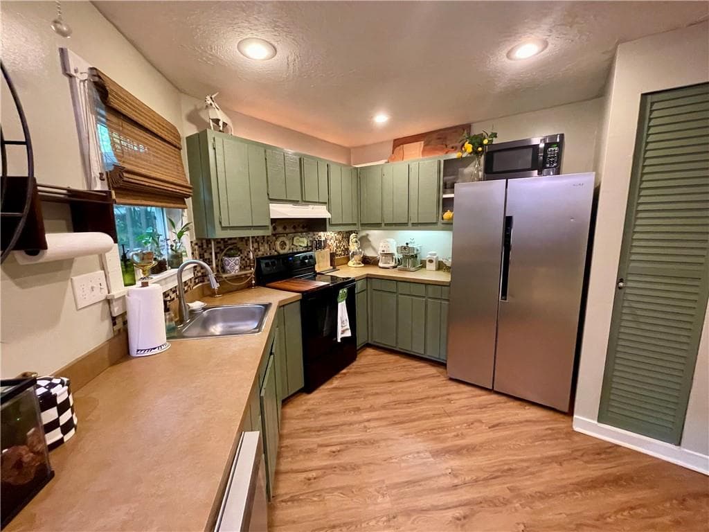 3 bedroom, 2 bathroom, 1,176 sq ft single family residence for sale at 3215 The Trail Road, Gainesville, GA 30501 — photo 9