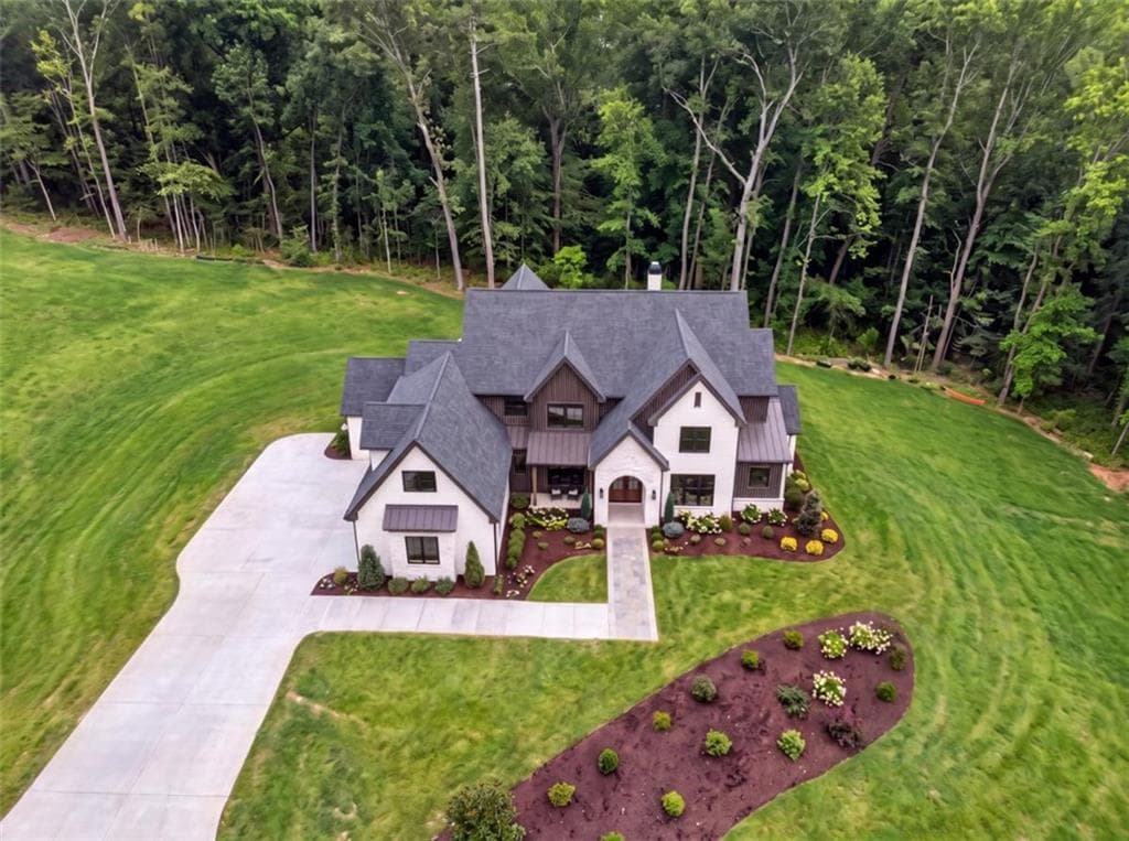 5 bedroom, 5 bathroom, 5,799 sq ft single family residence for sale at 616 Hoke Okelly Mill Road, Loganville, GA 30052 — photo 2