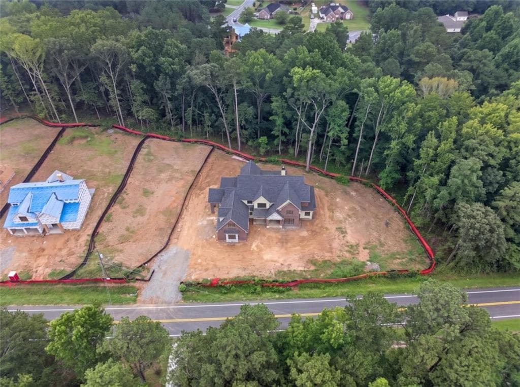 5 bedroom, 5 bathroom, 5,799 sq ft single family residence for sale at 616 Hoke Okelly Mill Road, Loganville, GA 30052 — photo 8