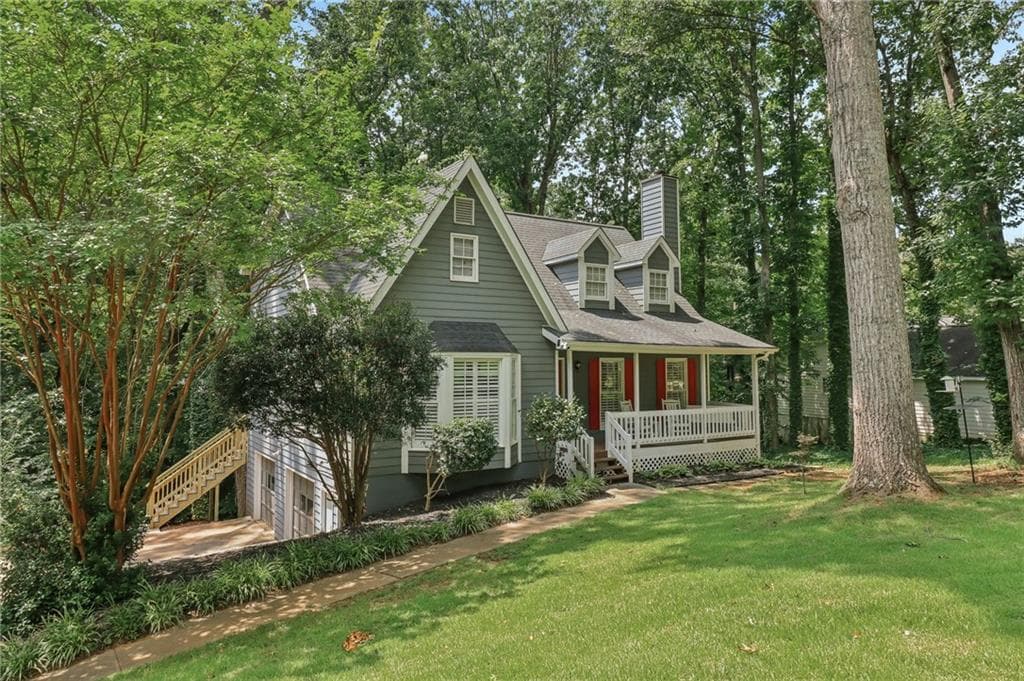 6 bedroom, 3 bathroom, 2,345 sq ft single family residence for sale at 1910 Fernwood Drive, Lawrenceville, GA 30043 — photo 2
