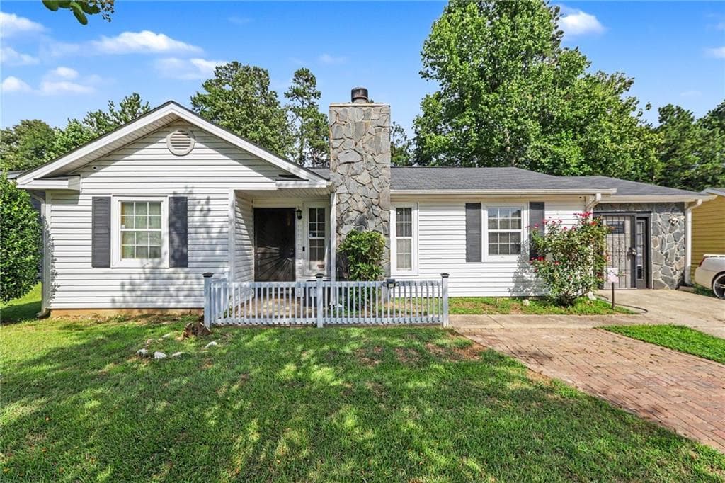 4 bedroom, 3 bathroom, 1,800 sq ft single family residence for sale at 2805 Robinson Wood Drive, Riverdale, GA 30296