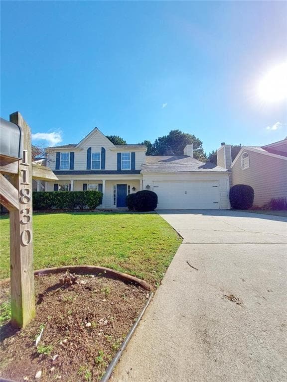 4 bedroom, 3 bathroom, 1,956 sq ft single family residence for sale at 11830 Carriage Park Lane, Johns Creek, GA 30097 — photo 1 of 25