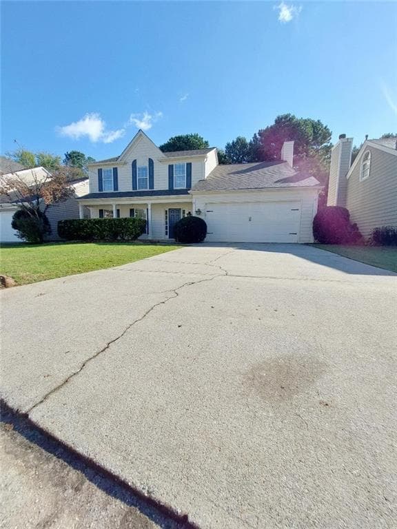 4 bedroom, 3 bathroom, 1,956 sq ft single family residence for sale at 11830 Carriage Park Lane, Johns Creek, GA 30097 — photo 2