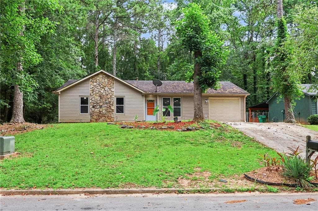 3 bedroom, 2 bathroom, 1,152 sq ft single family residence under contract at 5425 Timor Trail, Lithonia, GA 30038 — photo 6