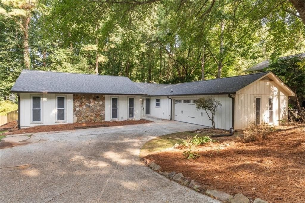 3 bedroom, 2 bathroom, 1,932 sq ft single family residence for sale at 9570 Hillside Drive, Roswell, GA 30076