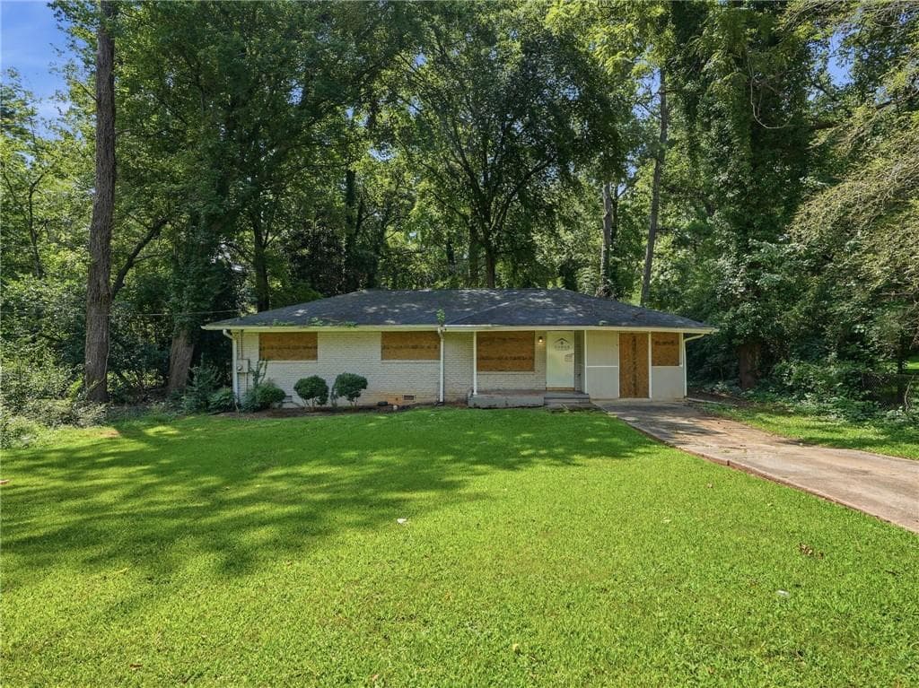 3 bedroom, 1 bathroom, 1,382 sq ft single family residence for sale at 4009 Kirksford Drive, Decatur, GA 30035 — photo 2