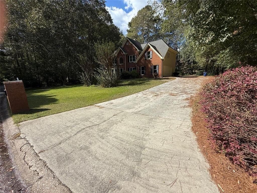 6 bedroom, 4 bathroom, 4,146 sq ft single family residence for sale at 2781 Jen Chris Drive, Snellville, GA 30039 — photo 2