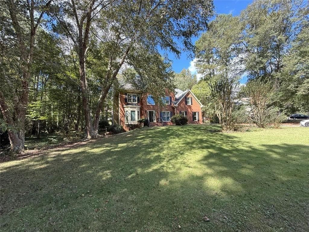 6 bedroom, 4 bathroom, 4,146 sq ft single family residence for sale at 2781 Jen Chris Drive, Snellville, GA 30039 — photo 3